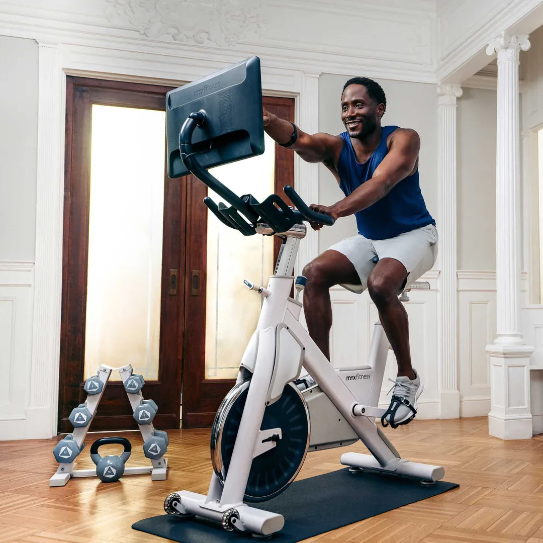 BODi+MYXFitness customer working out on his new excercise bike